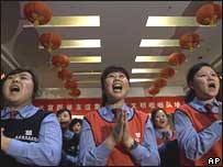 Chinesas torcendo