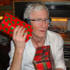 Paul looking unsure as to whether he wants to open his presents.