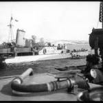 HMS Edinburgh getting supplies at the Kola Inlet 1942. HMS Edinburgh getting supplies at the Kola Inlet 1942.