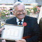 Sam with Harry Seacombe on the Highway programme as he receives a plaque on behalf of his Royal Irish Rangers regiment