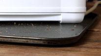A metal tray will help to protect the surface from too much heat