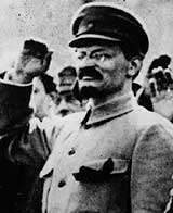 Photo of Leon Trotsky saluting in the street, October 1917