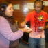 Adil begins to hand out notes of 'Money'