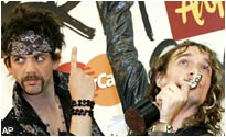 The Darkness celebrate winning their award