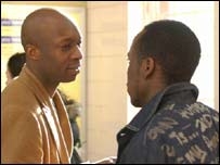 two men talking