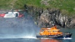 Heileacoptair Maoir-chladaich Steòrnabhaigh agus Bàta-teasairginn Bharraigh ann an Miughalaigh