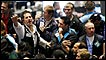 Traders work in the Euro Dollar pit at the Chicago Board of Trade