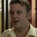 Douglas, clean-shaven and looking very like Archie