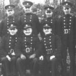 The firemen shown in the photograph are wearing the uniform of the National Fire Service. Charles Fredrick Taylor is shown standing third from the right. The firemen shown in the photograph are wearing the uniform of the National Fire Service. Charles Fredrick Taylor is shown standing third from the right.