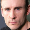 Cal Macaninch as John Keenan