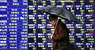 man walking past share display screen