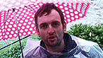 Maggot holding an umbrella