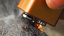 A battery sets strands of steel wool alight