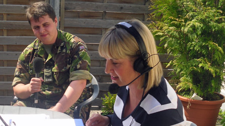 Lance Corporal Davies takes his turn with Louise and the microphone Lance Corporal Davies takes his turn with Louise and the microphone
