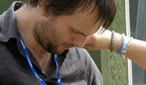Radio 2's video team attach a microphone to Jon to record the moment.