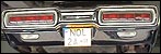 Rear of a car in a garage