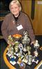 Marie Mc Kenna with her son Christopher's trophys from ballroom dancing
