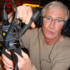 Paul just happened to have a screwdriver handy so he could fix the mic during the Kenny Rogers All-Star Triple…