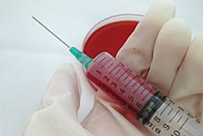 Syringe with blood