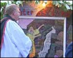 priest blessing a well at Longor