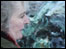 Maggi Hambling with a North Sea painting