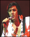 Richard Atkins as Elvis captured on stage in Truro
