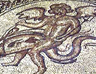 Cupid astride dolphin