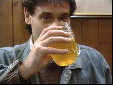 man drinking cider