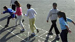 Kids playing hopscotch