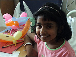 Child with balloons