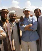 Dave Mann the head of UK fundraising for CORD with local Afghan villagers 