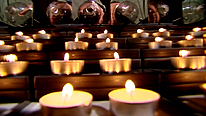 Lit candles that are about to be blown out with a bottle of CO2