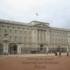 Buckingham Palace is behind the podcast