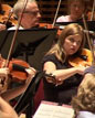 Liverpool Philharmonic violinists rehearsing