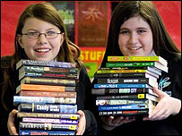 Students holding the 24 nominated books