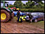 Tractor tows a car