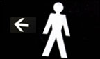 Sign pointing to the men's toilet