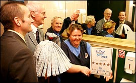 (l-r) Vincent Paliczka (direcotr leisure services, Cllr Iain McCracken, cleaners Isabella Green and Mervyn Burt.