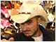 Zane searches in a hat
