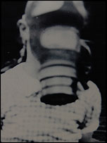 Elizabeth wearing a gas mask during World War II