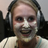 Becky in a straight jacket covered in trifle