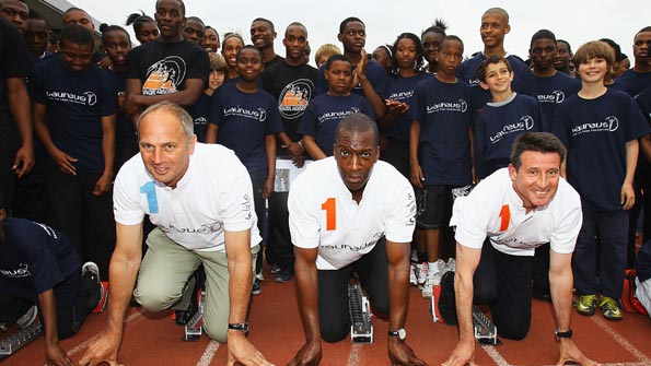 Lord Coe (far right) gets ready to race against United States sprinter Michael Johnson (centre) and five-time Olympic rowing gold medallist Sir Steve Redgrave