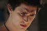 Kyle looking at his hand