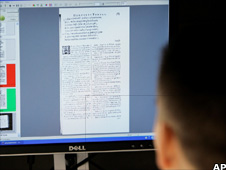 Man reading text on a computer