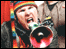 Angry man shouting through a megaphone
