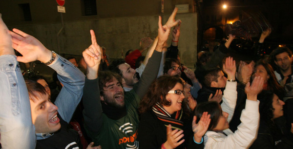 A crowd cheers