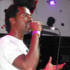 Homegrown Champ Ras Kwame talks to the crowd