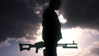 a soldier waits.