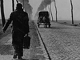 Photo of a French displaced person returning home