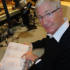 Here's Paul checking some facts about the music he's playing on the show.